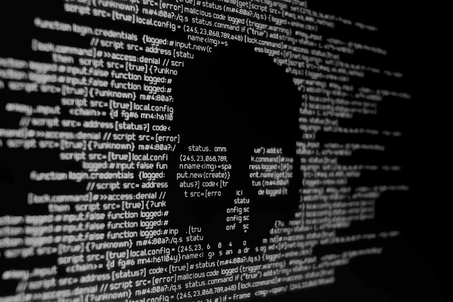 Skull silhouette formed from lines of malicious source code.